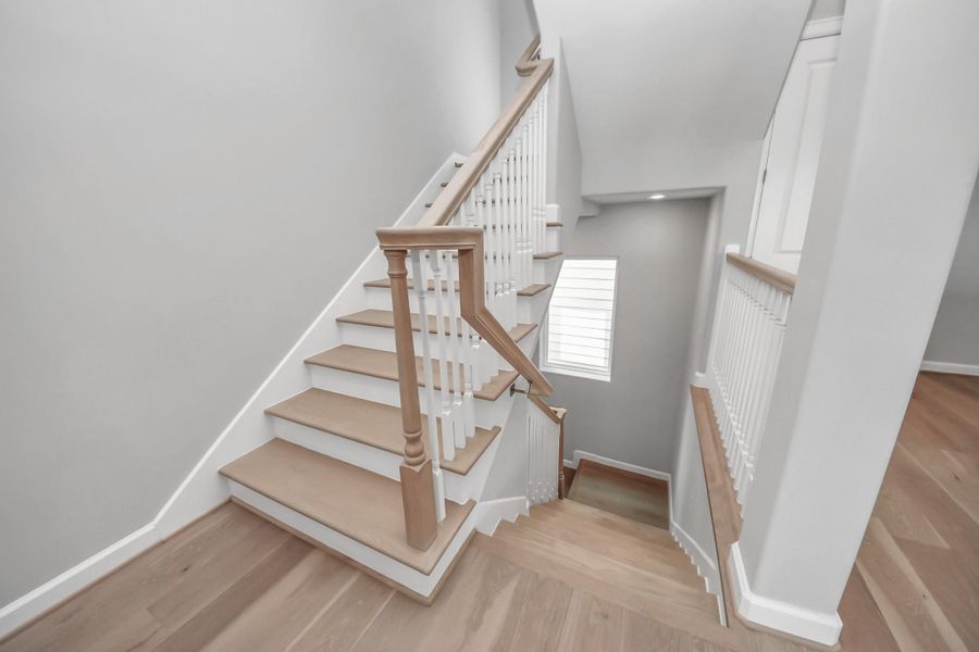 Staircase providing access between levels with simple, open design. Staircase providing access between levels with simple, open design.