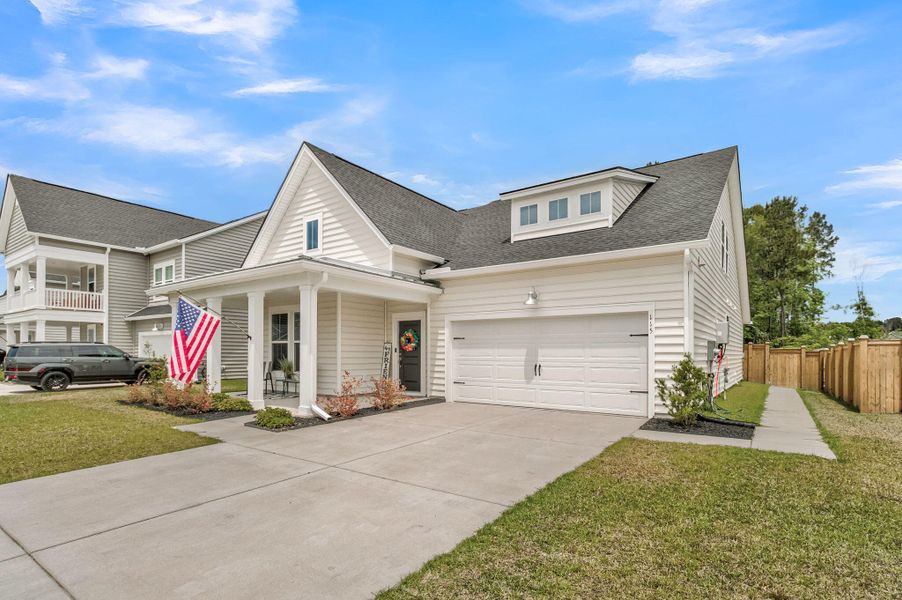 Front exterior of a new home in Heron's Walk at Summers Corner, Summerville, SC, highlighting curb appeal (Image 22).