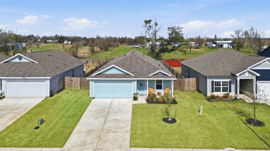 Front exterior of a new home in Trails at Cochran Ranch, Waller, TX, highlighting curb appeal (Image 21).
