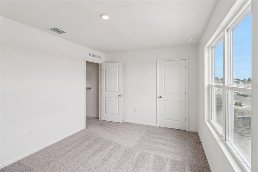 Spacious, unfurnished interior of a new home in Sumter Villas, Sumterville (Image 29).