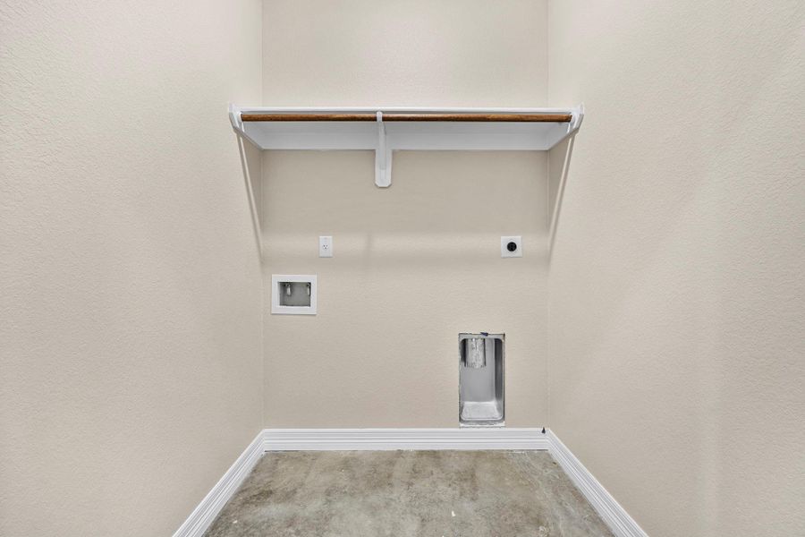Laundry room with hookup for an electric dryer, a textured wall, hookup for a washing machine, and light colored carpet