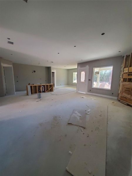 LIVING/ KITCHEN-DINING WHILE BEING PAINTED