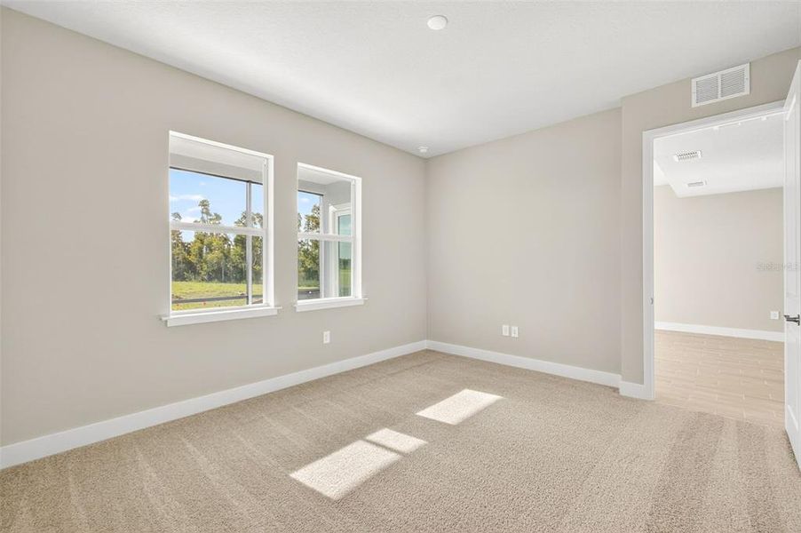 Spacious, unfurnished interior of a new home in Wellen Park, Venice (Image 21).