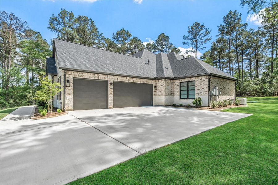 Front exterior of a new home in , Plantersville, TX, highlighting curb appeal (Image 2).