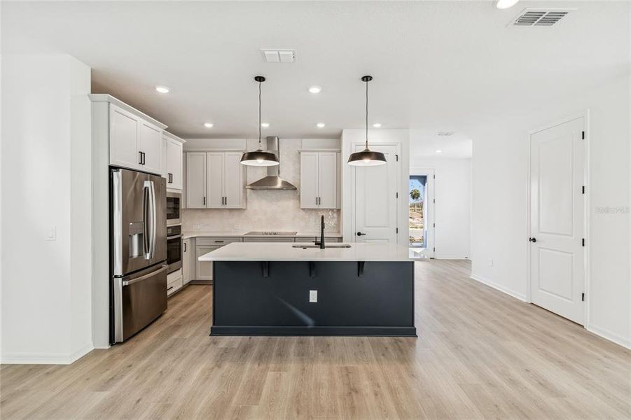 Furnished interior view inside a new home in Weslyn Park in Sunbridge 34', St. Cloud (Image 17).