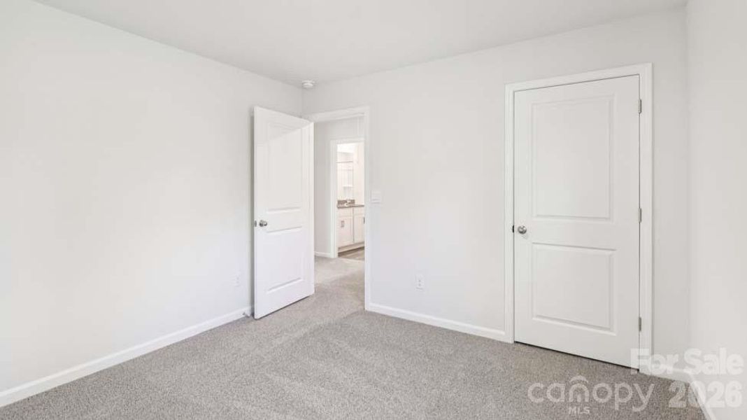 Spacious, unfurnished interior of a new home in Wallace Springs, Statesville (Image 37).