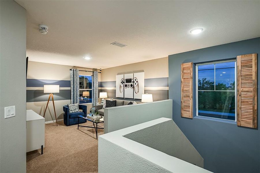 Furnished interior view inside a new home in Pasadena Landing, Wesley Chapel (Image 21).
