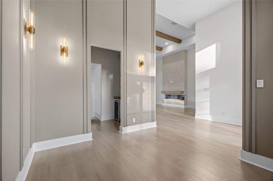 The open layout creates an effortless flow between the dining area, kitchen, and main living spaces. **Images are from a previously completed project. **