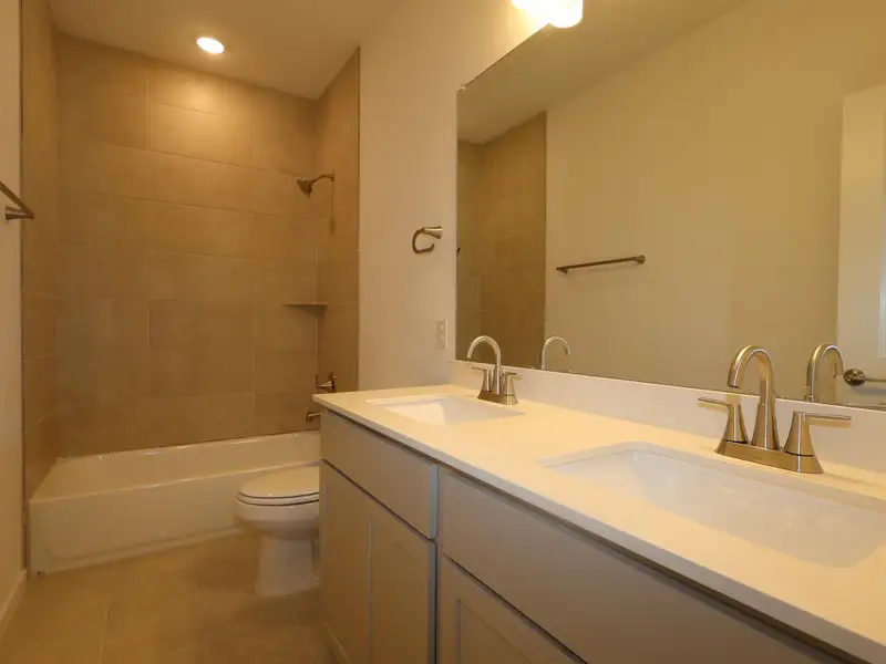 Furnished interior view inside a new home in Heritage, Dripping Springs (Image 4).
