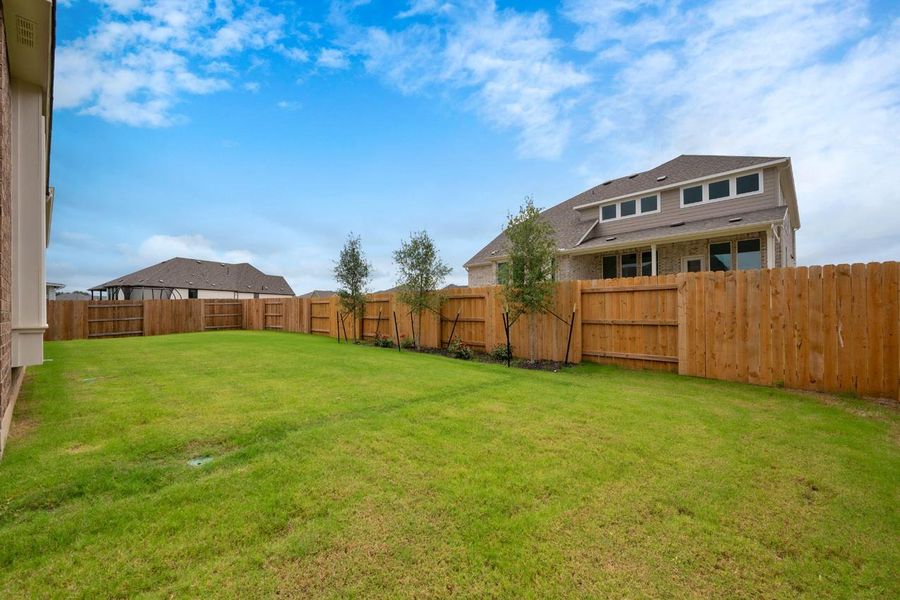 Exterior details and patio area of a home in 6 Creeks at Waterridge, Kyle (Image 21). Exterior details and patio area of a home in 6 Creeks at Waterridge, Kyle (Image 21).