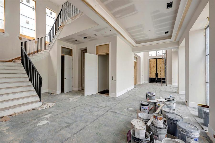 Looking towards the front entrance. Study on the left. Staircase leads to the 2nd floor. Also pictured are the coat closet and elevator. Stage of construction as of April 3, 2025. Looking towards the front entrance. Study on the left. Staircase leads to the 2nd floor. Also pictured are the coat closet and elevator. Stage of construction as of April 3, 2025.