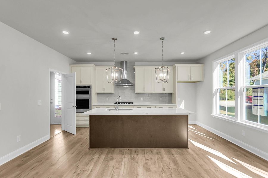 Furnished interior view inside a new home in Sweetgrass Station, Summerville (Image 13).