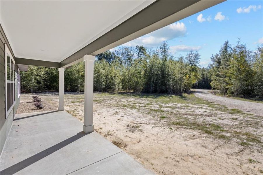 Exterior details and patio area of a home in , Bell (Image 21).