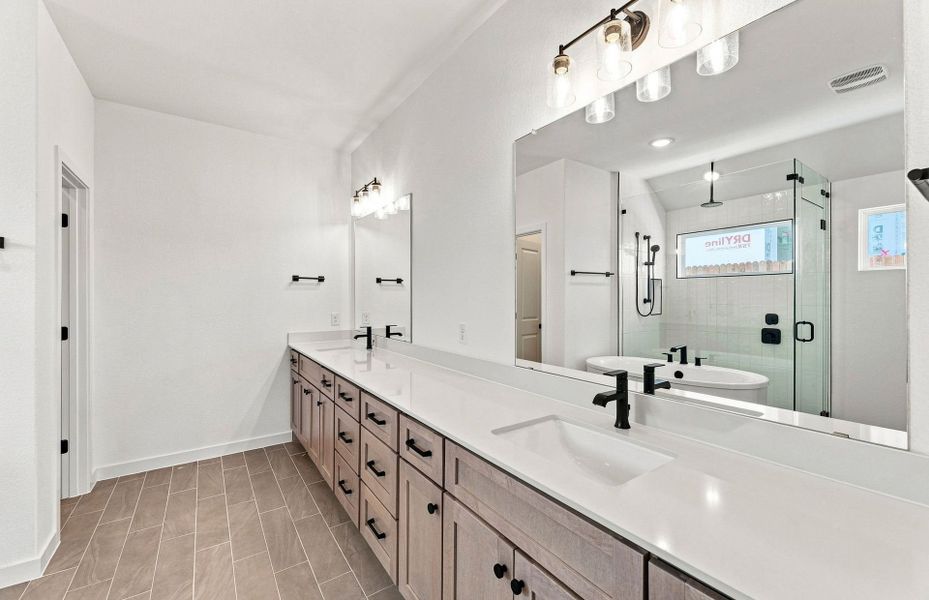 Representative furnished interior of a home built from the Elliott by Pulte Homes in West Cypress Hills, Spicewood (Image 5).