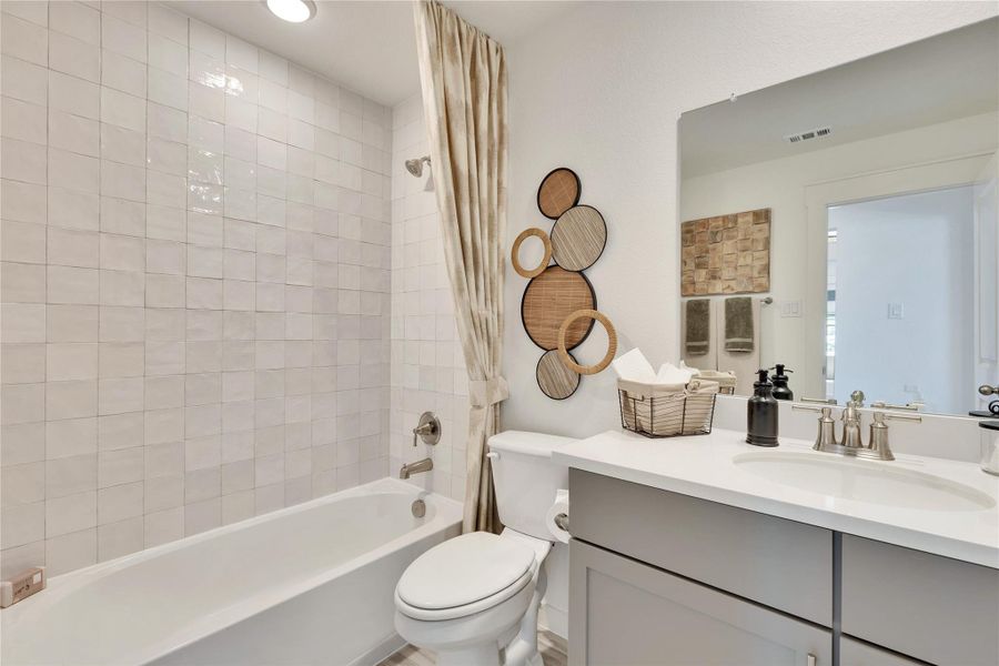 Model home photos of similar floorplans, not pictures of actual home.