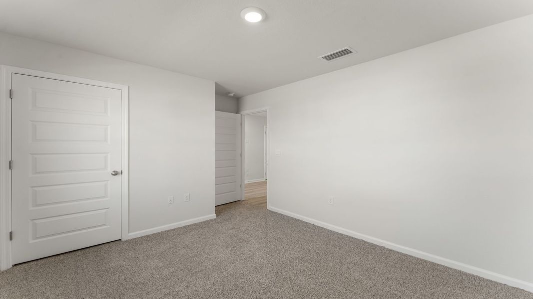 Representative unfurnished interior of a home built from the The Freeport by D.R. Horton in Hodges Bayou Plantation, Panama City (Image 16). Representative unfurnished interior of a home built from the The Freeport by D.R. Horton in Hodges Bayou Plantation, Panama City (Image 16).