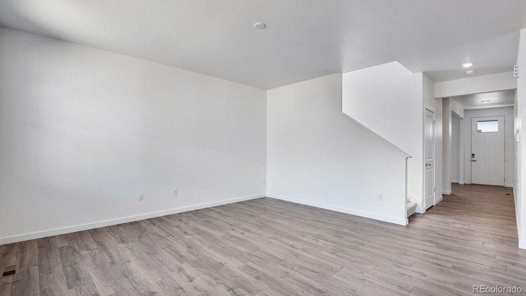 Spacious, unfurnished interior of a new home in Sky Ranch, Watkins (Image 30).