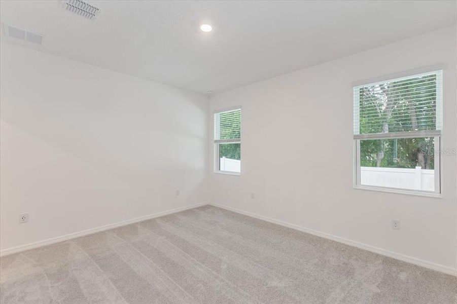 Spacious, unfurnished interior of a new home in Liberty Station, Orange City (Image 9).