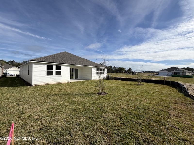 Exterior details and patio area of a home in The Cypress Series at Reserve East, Flagler Beach (Image 17).