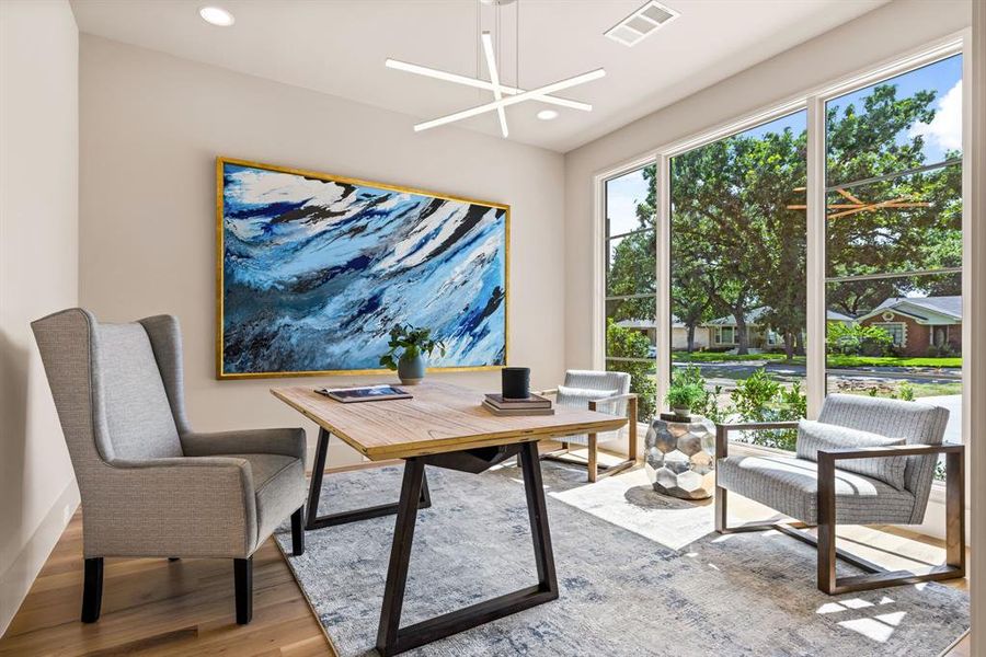 Home office with wood finished floors and recessed lighting Home office with wood finished floors and recessed lighting