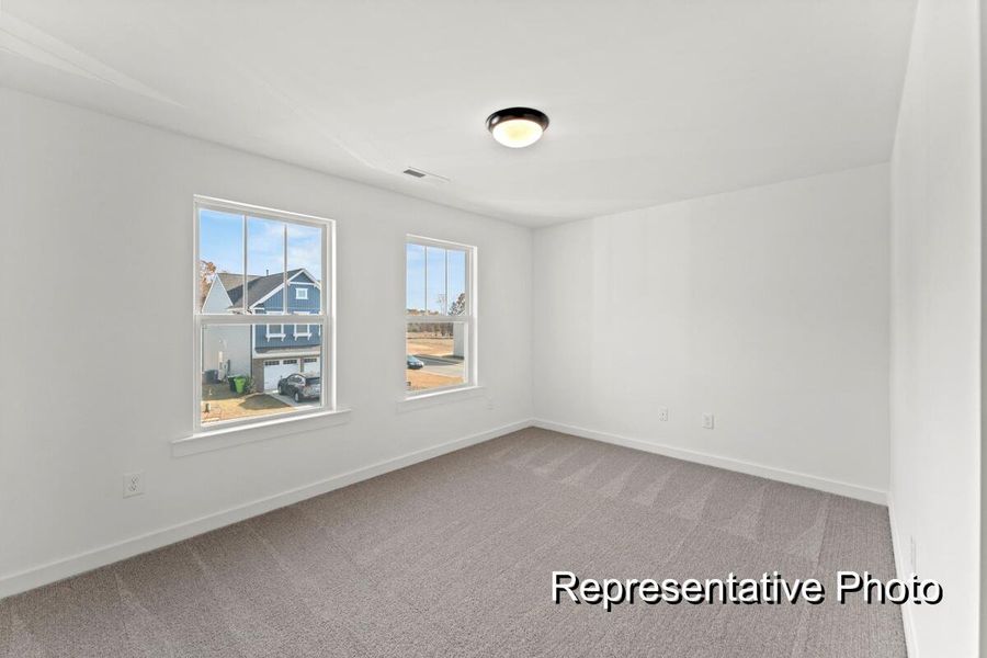 Spacious, unfurnished interior of a new home in Reeves Crossing, St. George (Image 17).