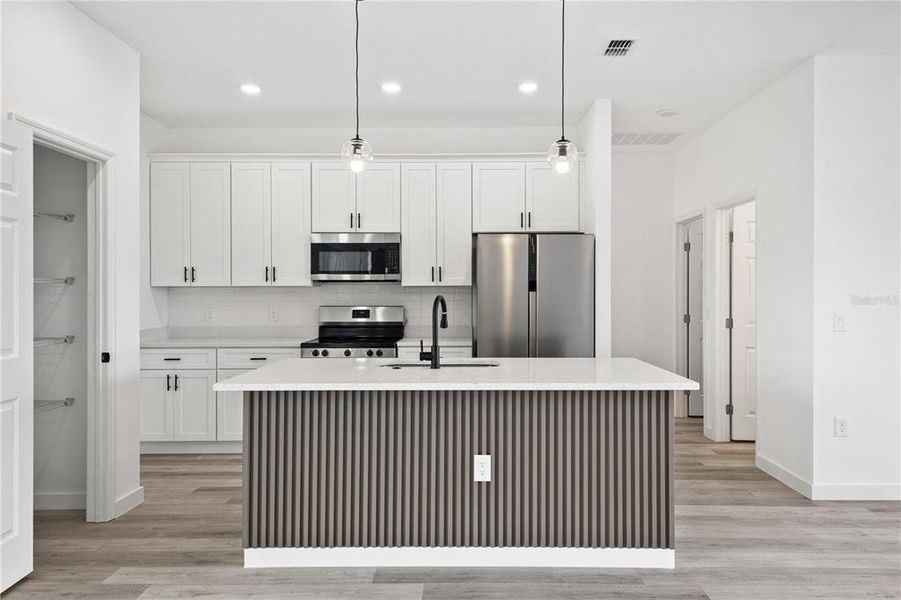 Furnished interior view inside a new home in , Poinciana (Image 7). Furnished interior view inside a new home in , Poinciana (Image 7).