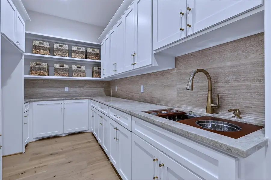 Stunning scullery!! Secondary prep area complete with ample storage and workspace.