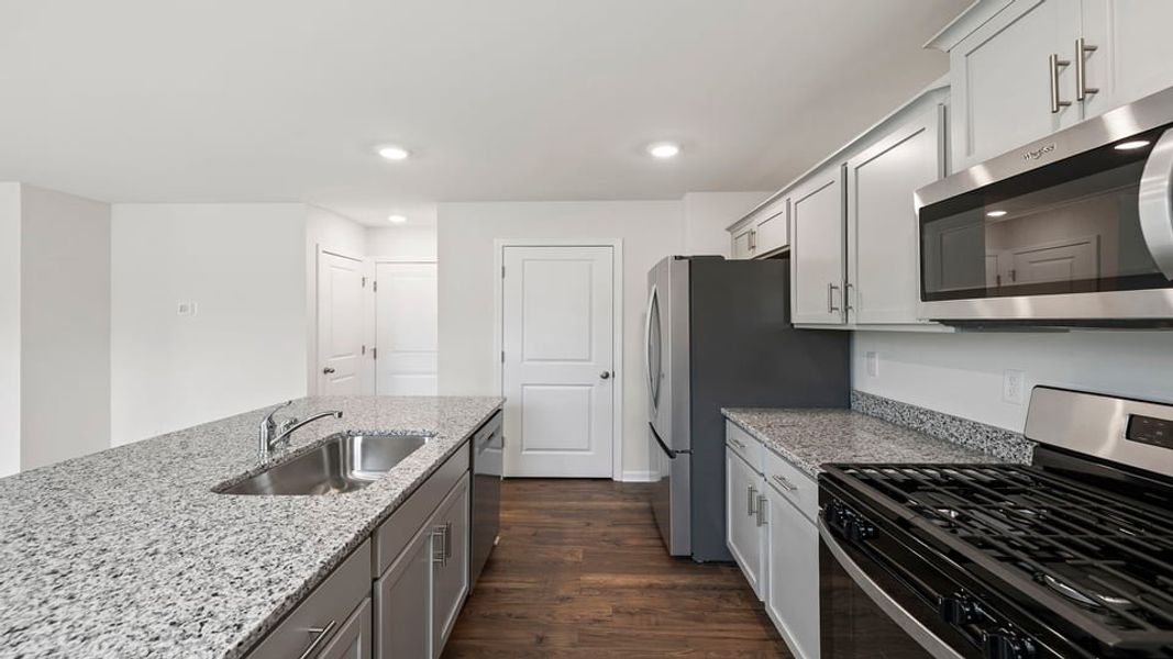 Furnished interior view inside a new home in Bentley Park, Greenwood (Image 7).
