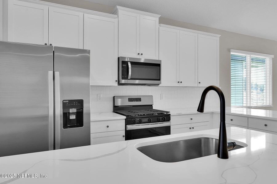 Furnished interior view inside a new home in Jennings Farm, Middleburg (Image 5).