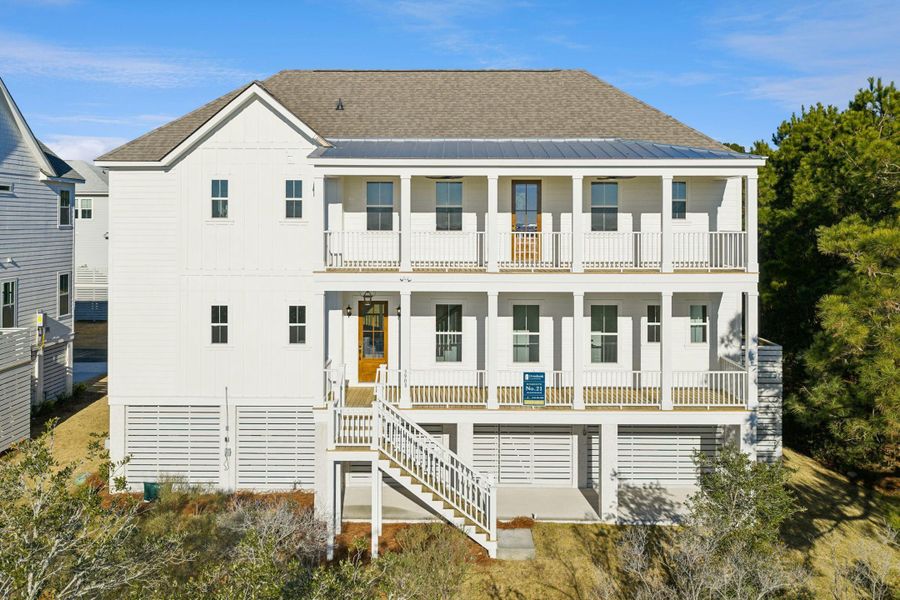 Exterior details and patio area of a home in Overlook at Copahee Sound, Awendaw (Image 39).