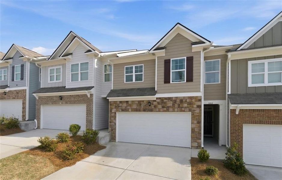 Front exterior of a new home in , Dahlonega, GA, highlighting curb appeal (Image 22).