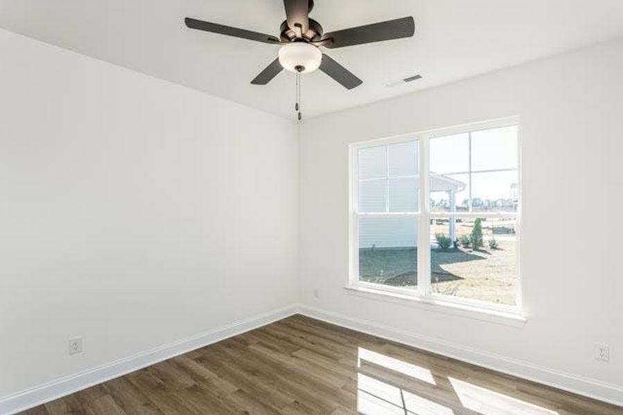 Spacious, unfurnished interior of a new home in Daniel Farms, Benson (Image 23).