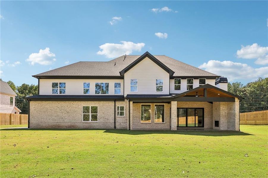 Exterior details and patio area of a home in , Hoschton (Image 33).