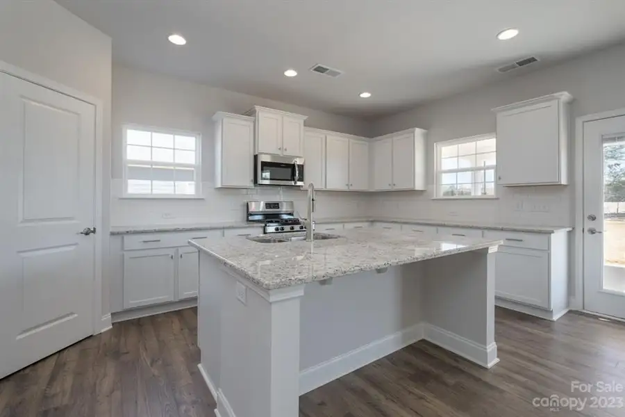 Representative furnished interior of a home built from the 3119 by Adams Homes in Hidden Pines, Cameron (Image 4).