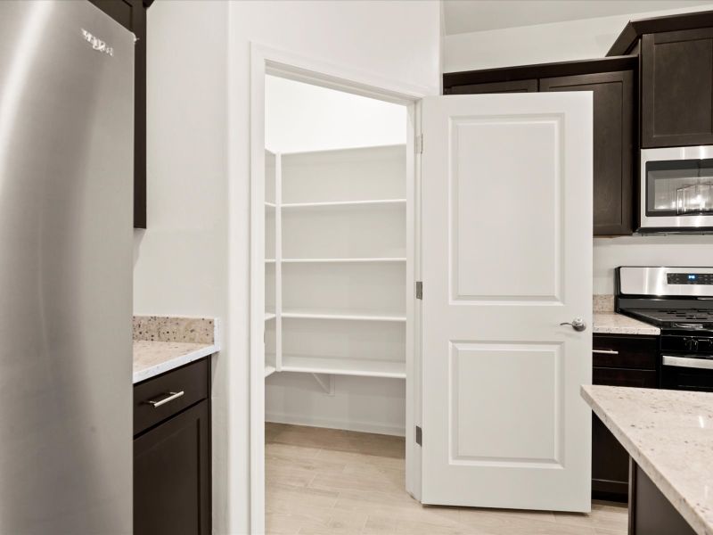 Furnished interior view inside a new home in Las Patrias at Star Valley Phase III - Premier Series, Tucson (Image 4).