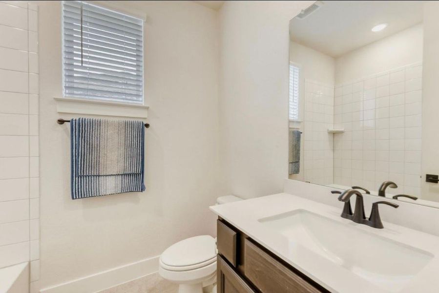 Full bathroom featuring vanity and bathtub / shower combination