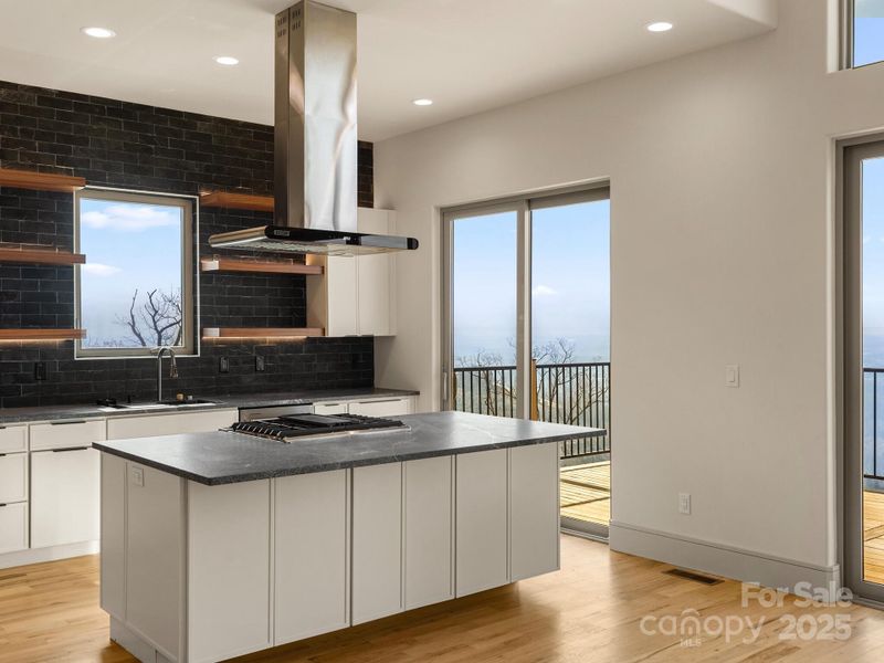 Kitchen with easy access to deck and beautiful views