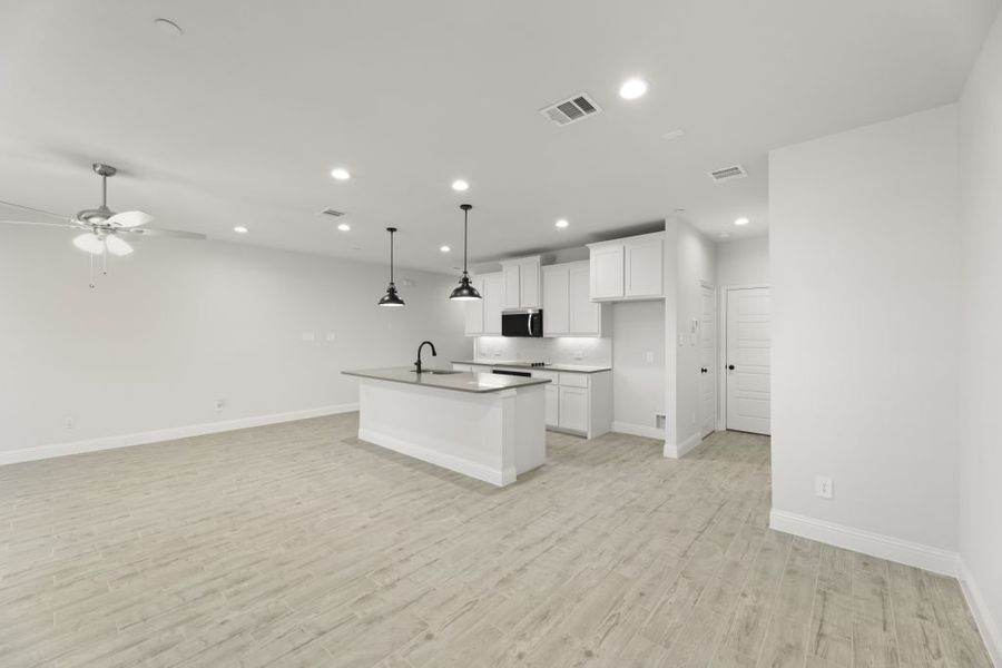 Front exterior of a new home in Sereno Oaks at Buckner Terrace, Dallas, TX, highlighting curb appeal (Image 14). Front exterior of a new home in Sereno Oaks at Buckner Terrace, Dallas, TX, highlighting curb appeal (Image 14).