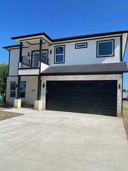 Front exterior of a new home in , Dallas, TX, highlighting curb appeal (Image 1). Front exterior of a new home in , Dallas, TX, highlighting curb appeal (Image 1).