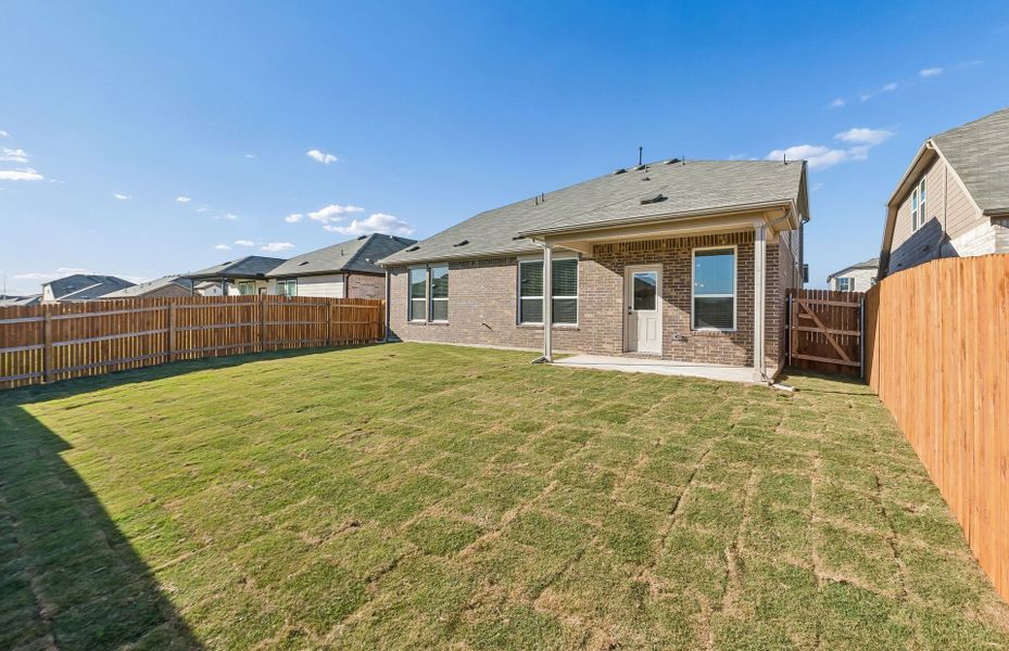 Exterior details and patio area of a home in Lagos, Manor (Image 29).