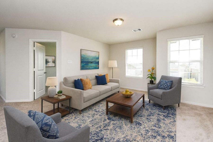 Another view of the spacious game room with a glimpse into one of the bedrooms. (Virtually staged by A.I.) Another view of the spacious game room with a glimpse into one of the bedrooms. (Virtually staged by A.I.)