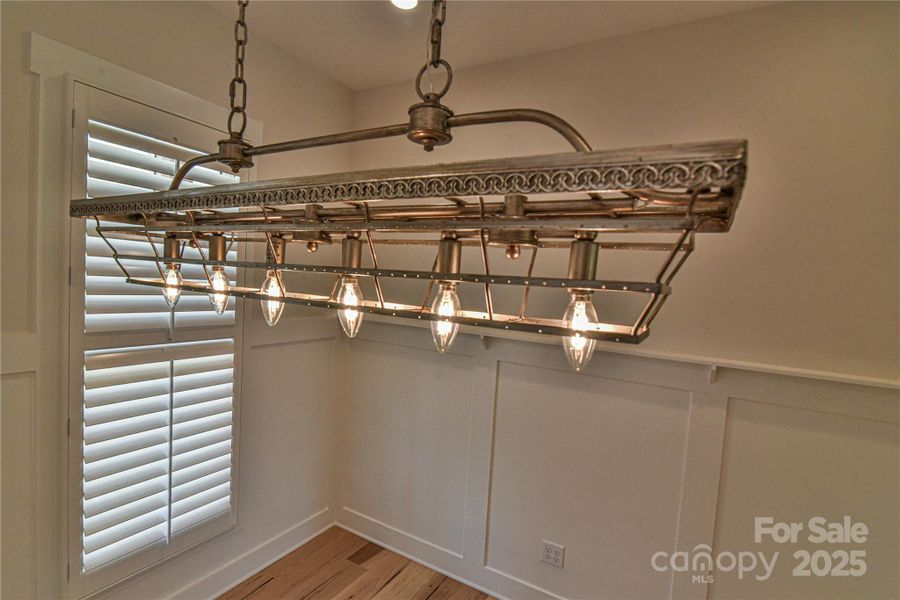 Cool light fixture in the dining area. Similar photo.