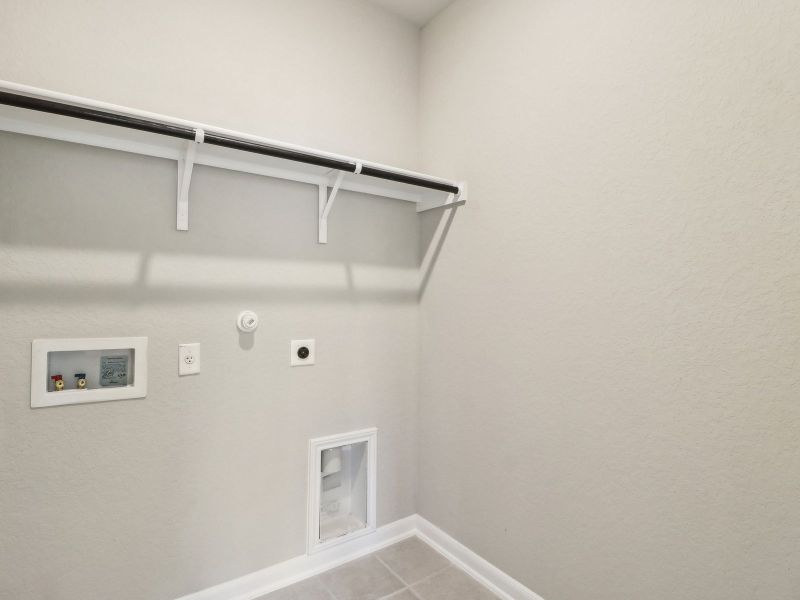 Laundry room in the Medina floorplan at a Meritage Homes community. Laundry room in the Medina floorplan at a Meritage Homes community.