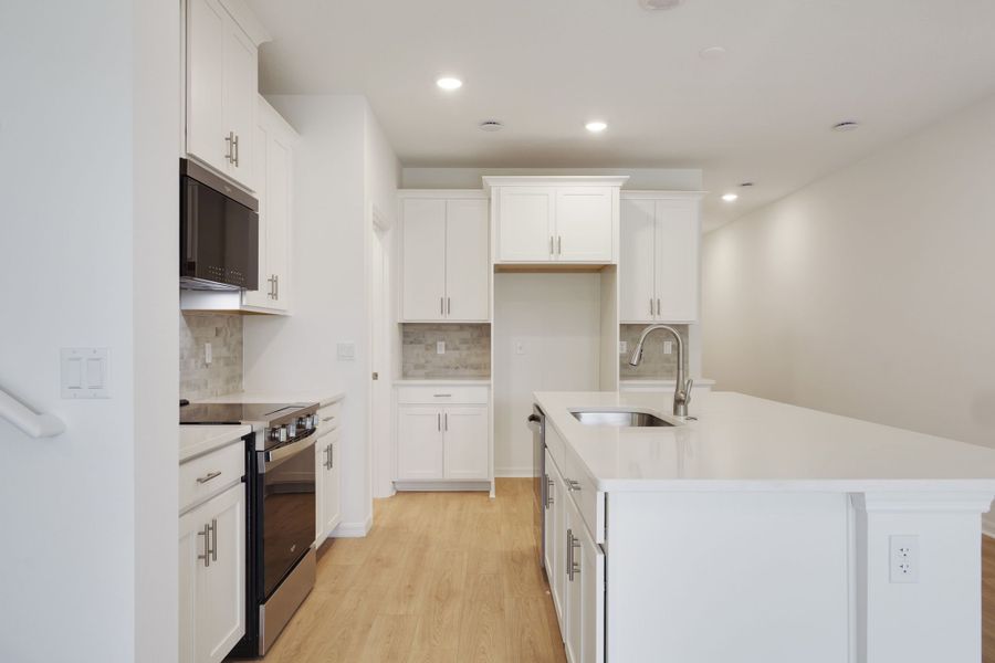 Furnished interior view inside a new home in Towns at Riverwalk, Sanford (Image 7).