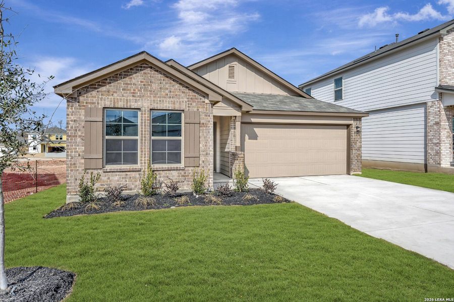 Front exterior of a new home in Agave, San Antonio, TX, highlighting curb appeal (Image 1). Front exterior of a new home in Agave, San Antonio, TX, highlighting curb appeal (Image 1).