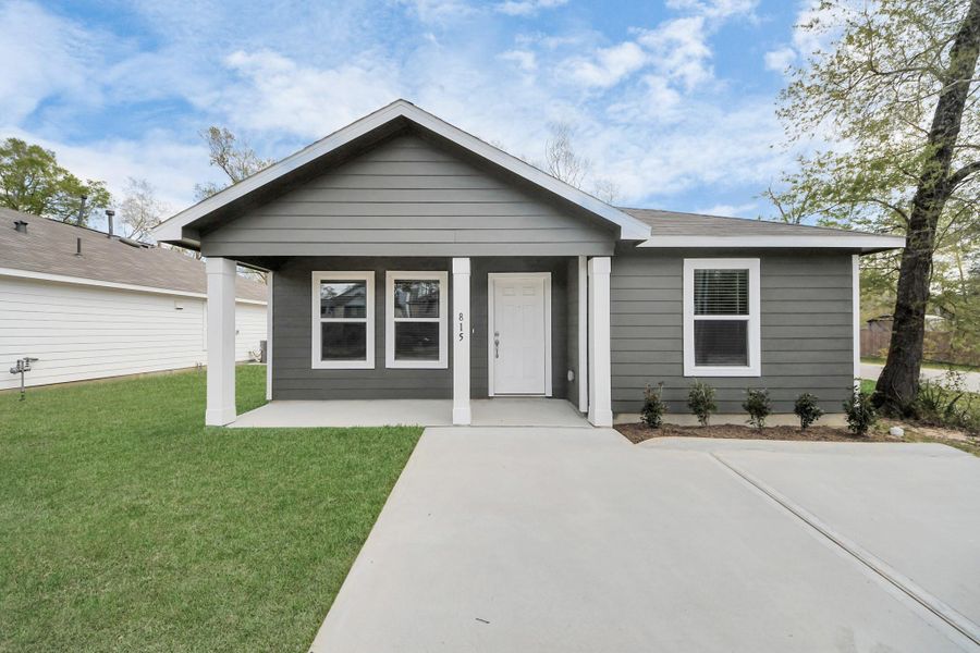 Front exterior of a new home in , Cleveland, TX, highlighting curb appeal (Image 18). Front exterior of a new home in , Cleveland, TX, highlighting curb appeal (Image 18).