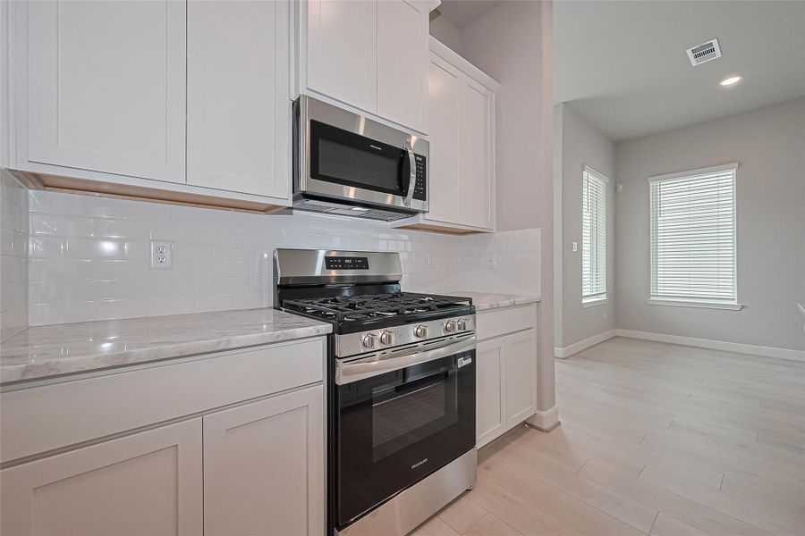 Furnished interior view inside a new home in Regents Court, Houston (Image 8).