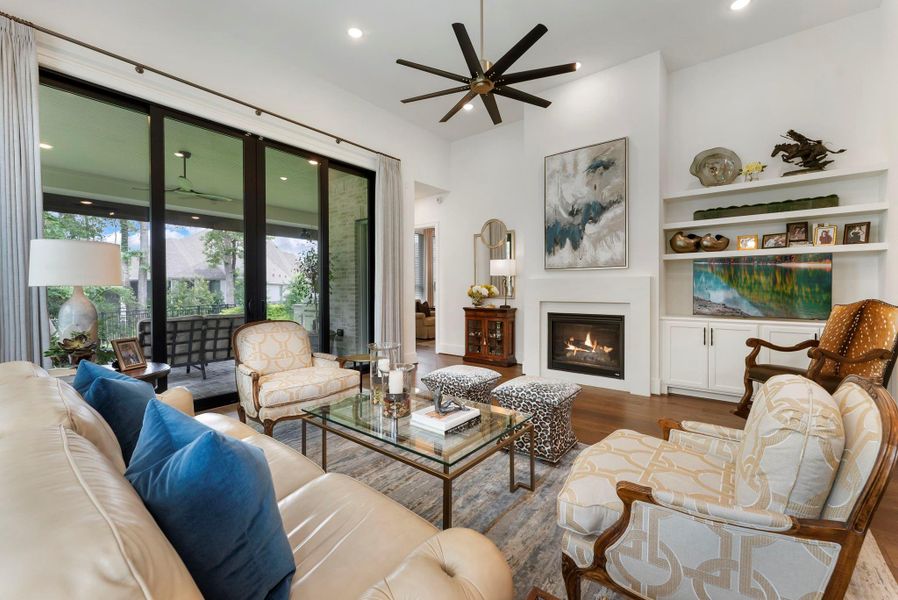 Designed for comfort, connection, and natural light. Custom details, premium fan selections, gas fireplace, and upgraded glass sliders make the space feel both practical and elevated.