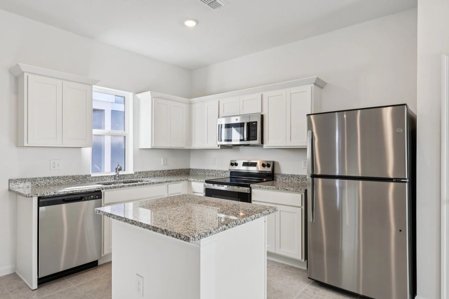 Representative furnished interior of a home built from the Keele by Starlight Homes in Hawks Run, Kissimmee (Image 11).