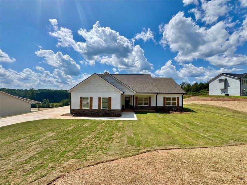 Front exterior of a new home in , Eastanollee, GA, highlighting curb appeal (Image 19). Front exterior of a new home in , Eastanollee, GA, highlighting curb appeal (Image 19).